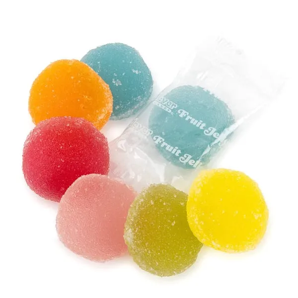 Clever Candy Fruit Jelly Jewels, sugar-coated round jellies in orange, blue, red, pink, green and yellow, one in its clear wrapper