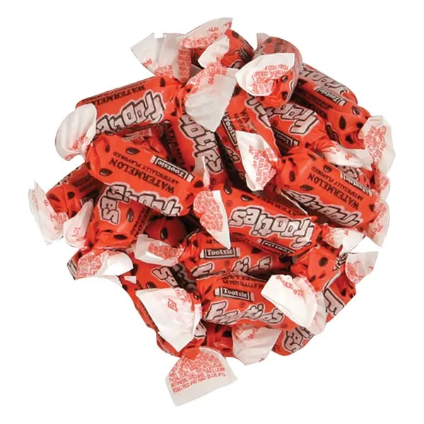 A pile of watermelon Tootsie Frooties in red and white twist wrappers