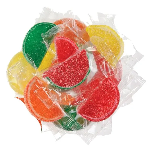 Sugar-coated fruit jelly slices in orange, lemon, lime and watermelon, each in a clear wrapper